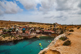 Fototapeta Desenie - Famous Popeye village in Malta. Azure bay in the rocks.