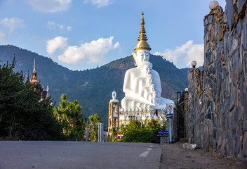 Road to buddha statue in afternoon time.