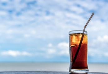 Drinking water to feel refreshed Against the sky background.