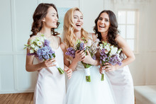 Laughing Bride With Bridesmaids
