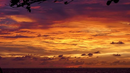 Wall Mural - The sky and the clouds at sunset, beautiful black orange red