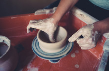 Work In A Pottery Workshop, Womans Hands Creating Ceramics. 