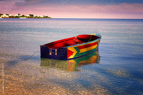 Traditional Jamaican fishing boat floating out from the beach on Bloody Bay, Jamaica Poster Mural XXL