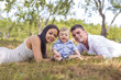 © Louis-Paul Photo - Happy Family Having fun with baby playing In The Park.