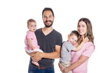 Wall Mural - happy smiling family of four isolated on white background