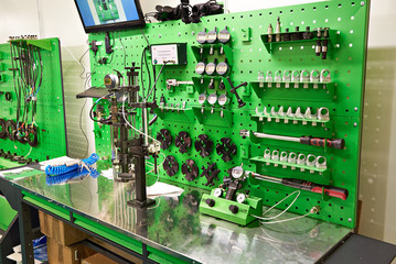 Poster - Worktable with tools in car repair shop