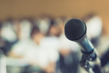 microphone voice speaker with audiences or students in seminar classroom, lecture hall or conference