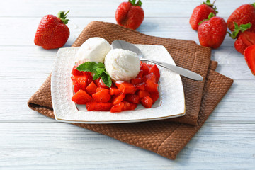 Sticker - Plate with delicious strawberry and ice-cream on wooden table