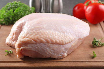 Wall Mural - Fresh raw turkey fillet on cutting board