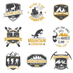 Wall Mural - vintage typography design with mountaineers and mountain silhouette.