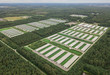 Aerial view of poultry farm among forest