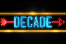 Decade  - Fluorescent Neon Sign On Brickwall Front View