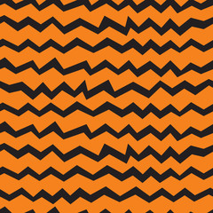 Vector seamless Halloween chevron pattern. Black and orange zigzag lines. Good for Halloween cards, polygraphy, stuff.