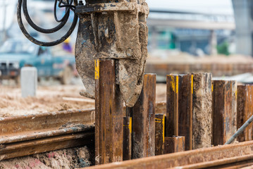 Retaining wall steel sheet pile driving machine work