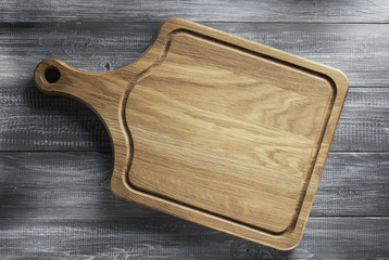 Poster - cutting board at wooden table