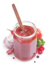 Poster - tomato sauce in glass jar on white