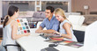 © JackF - couple are consulting with seller about the colors of furniture