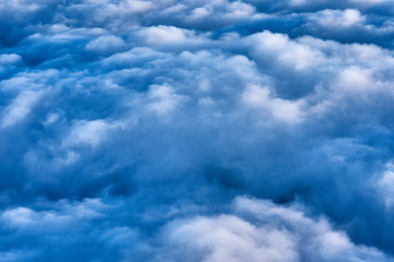 Canvas Print - clouds and blue sky seen from airplane