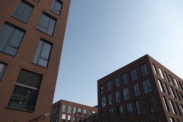 modern office building with red brick facade