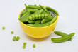 Green sugar snap peas isolated on white background.