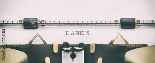 Fotografía Danke word in capital letters on white sheet