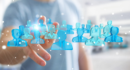 Aufkleber - Businessman holding 3D rendering group of blue people