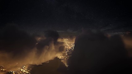 Wall Mural - flying over the deep night timelapse clouds with dark sky. seamlessly looped animation. flight throu
