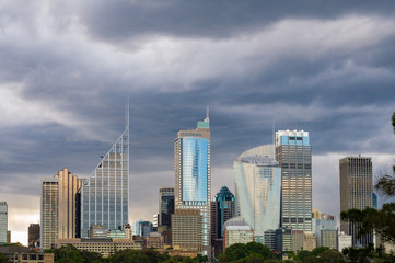 Wall Mural - Modern cityscape view with clouds on the background