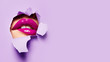 Leinwandbild Motiv Beautiful plump bright lips of pink color peep into the slit of colored paper.