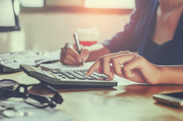 Poster - businessman working on desk office using calculator business financial accounting concept
