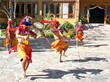 PARO, BHUTAN - November10, 2012 : Bhutanese dancers with colorful mask performs traditional dance at hotel in Paro, Bhutan
