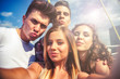 © leszekglasner - Selfie of group of teenage friends outdoor