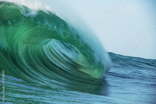 Big beautful perfect surfing waves barreling in the Atlantic Ocean.