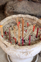 Wall Mural - Bâtonnets d'encens. Wat Simuong. Wat Si Muang. Vientiane. Laos. / Incense sticks. Wat Simuong. Wat Si Muang. Vientiane. Laos.