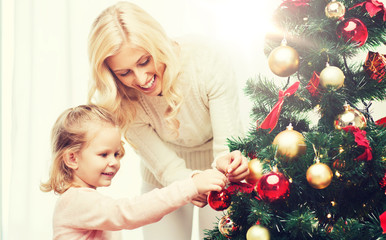 Canvas Print - happy family decorating christmas tree at home