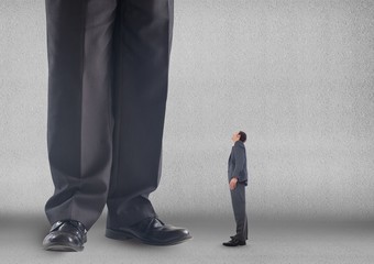 Poster - Small business man looking at a big business man