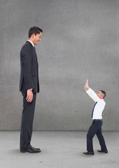 Poster - Small business man looking at a big business man
