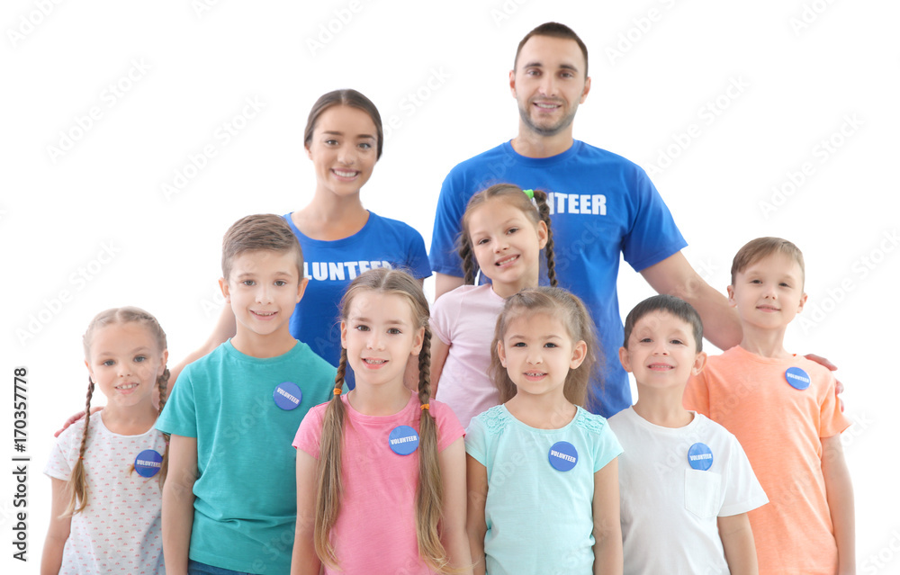 Happy volunteers with children on white background