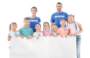 Sticker - Happy volunteers and children holding blank poster on white background