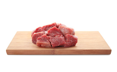 Canvas Print - Wooden board with pieces of fresh raw meat on white background