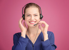 Beautiful Young Woman With Headset On Color Background
