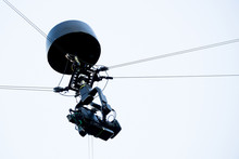 A Television Camera Hangs On Cables For Football Or A Concert