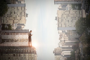 Poster - Composite image of full length of businesswoman using mobile