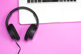 Fototapeta Do pokoju - Headphones on pink background