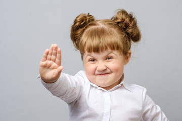 girl making stop gesture with her hand