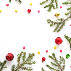 Wall Mural - Christmas background. Fir branches isolated on white background. Christmas tree. Christmas toys, snow, fir, rowan in frost, top view. Composition of fir branches, pattern. Christmas frame.