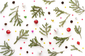 Wall Mural - Christmas background. Fir branches isolated on white background. Christmas tree. Christmas toys, snow, fir, rowan in frost, top view. Composition of fir branches, pattern. Christmas frame.