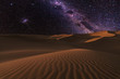 Amazing views of the Sahara desert under the night starry sky.