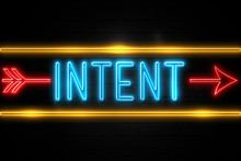 Intent  - Fluorescent Neon Sign On Brickwall Front View