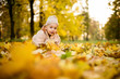 © Martinan - Crawling baby boy outdoors in autumn park
